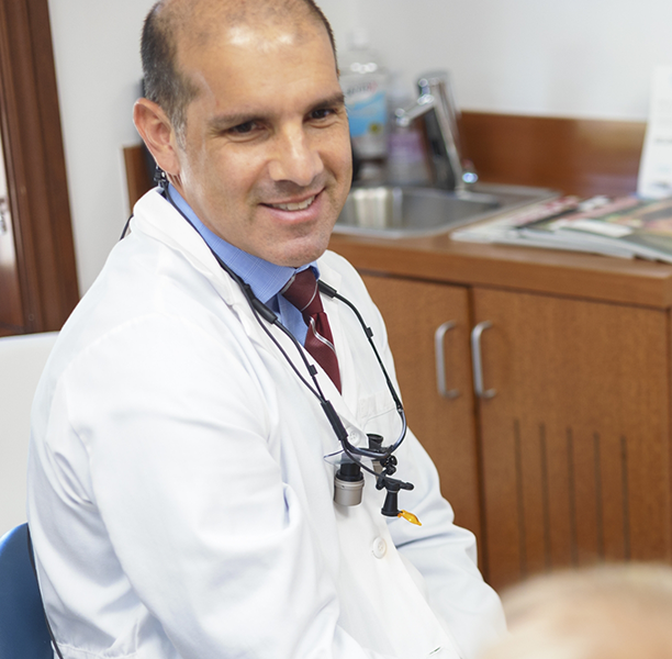 Doctor Lamberti talking with a patient